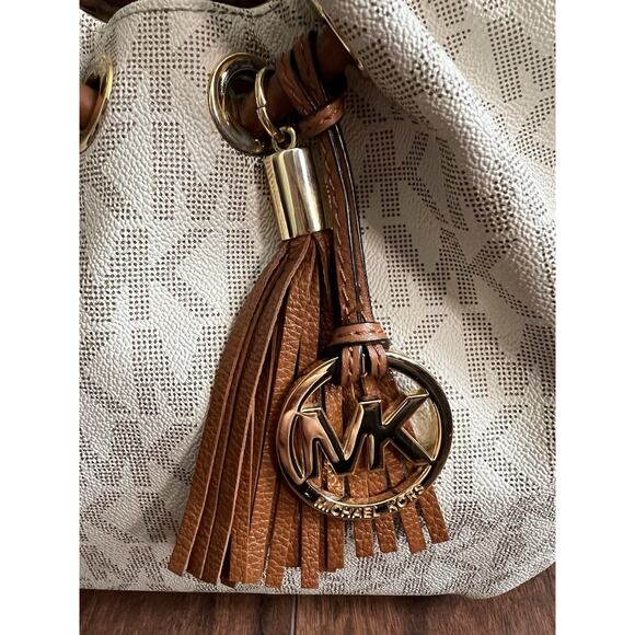 MICHAEL KORS Signature Canvas Leather Tasseled Ring Bucket Tote with BONUS - Picture 2 of 16